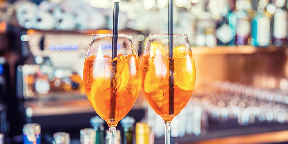 aperol spritz cocktails at the bar